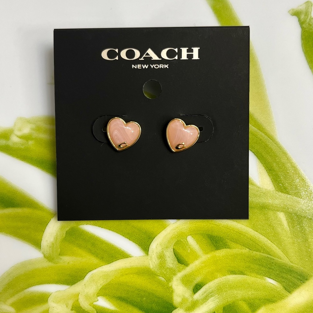 NWT coach earrings, gold and pink heart-shaped model.